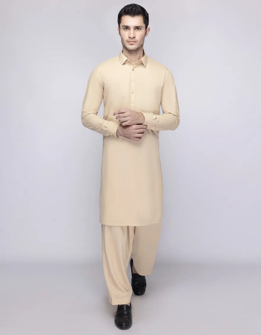 Junaid Jamshed Cream Blended Unstitched Fabric for men's Kameez Shalwar, presented in a neat fold, available at HayaStyle India.