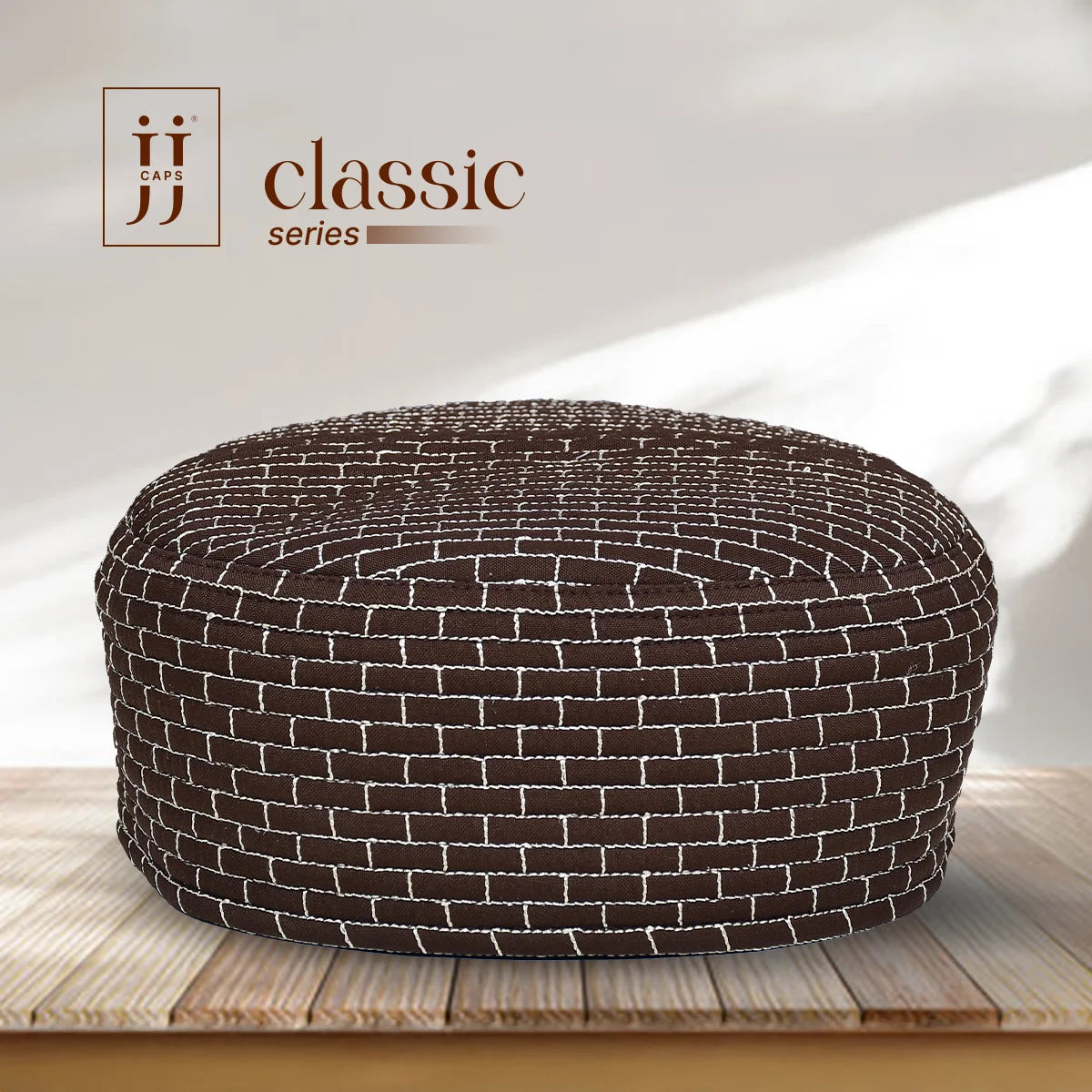 HayaStyle reversible Kufi cap showing the Brown Gaza design with cream embroidery.