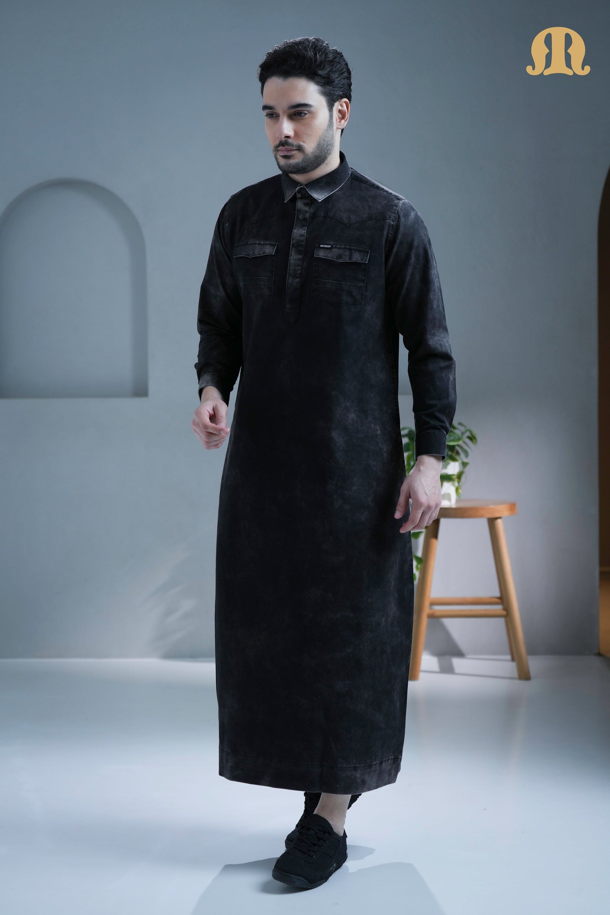 Close-up of the durable cotton denim fabric on the Brimstone Thobe.