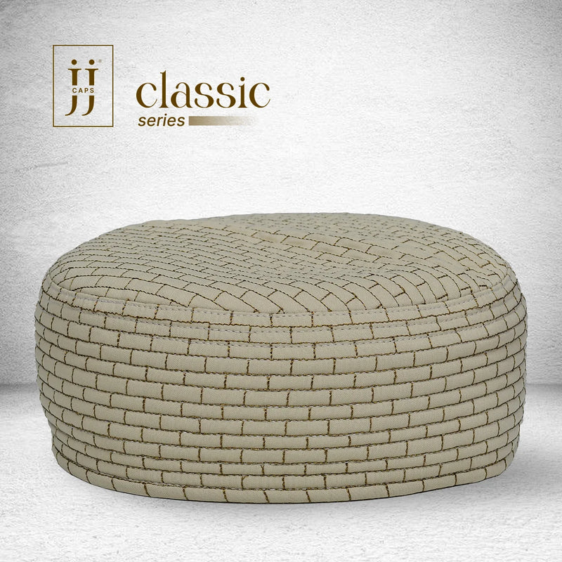 HayaStyle reversible Kufi cap in cream with bold Gaza design and mustard threads.