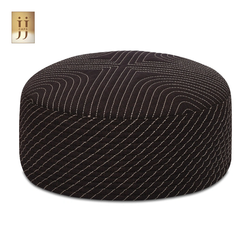 Close up of the intricate Sham and ZamZam patterns on this reversible JJ Topi.