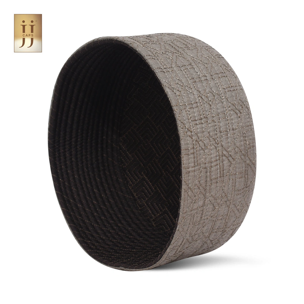 Close-up of the Stone Brown Riyad design on a Haya Style reversible JJ Topi.