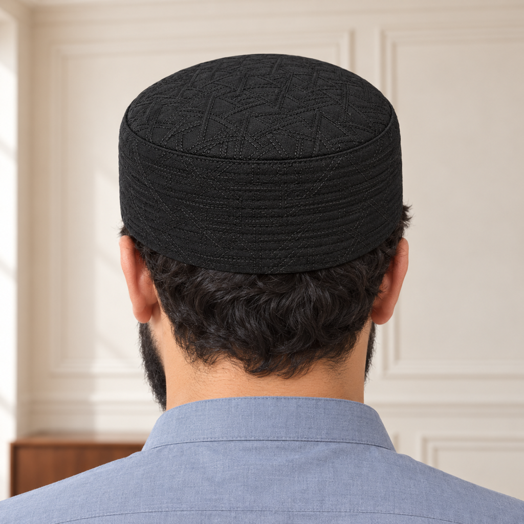 JJ Caps black reversible kufi — back close-up on HayaStyle model