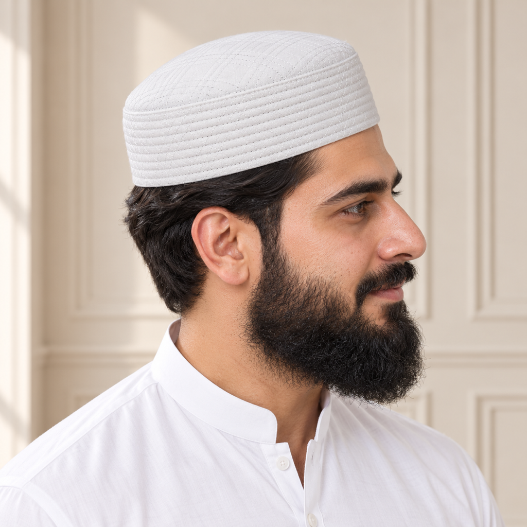 JJ Caps White Uhud reversible kufi — side close-up on HayaStyle model