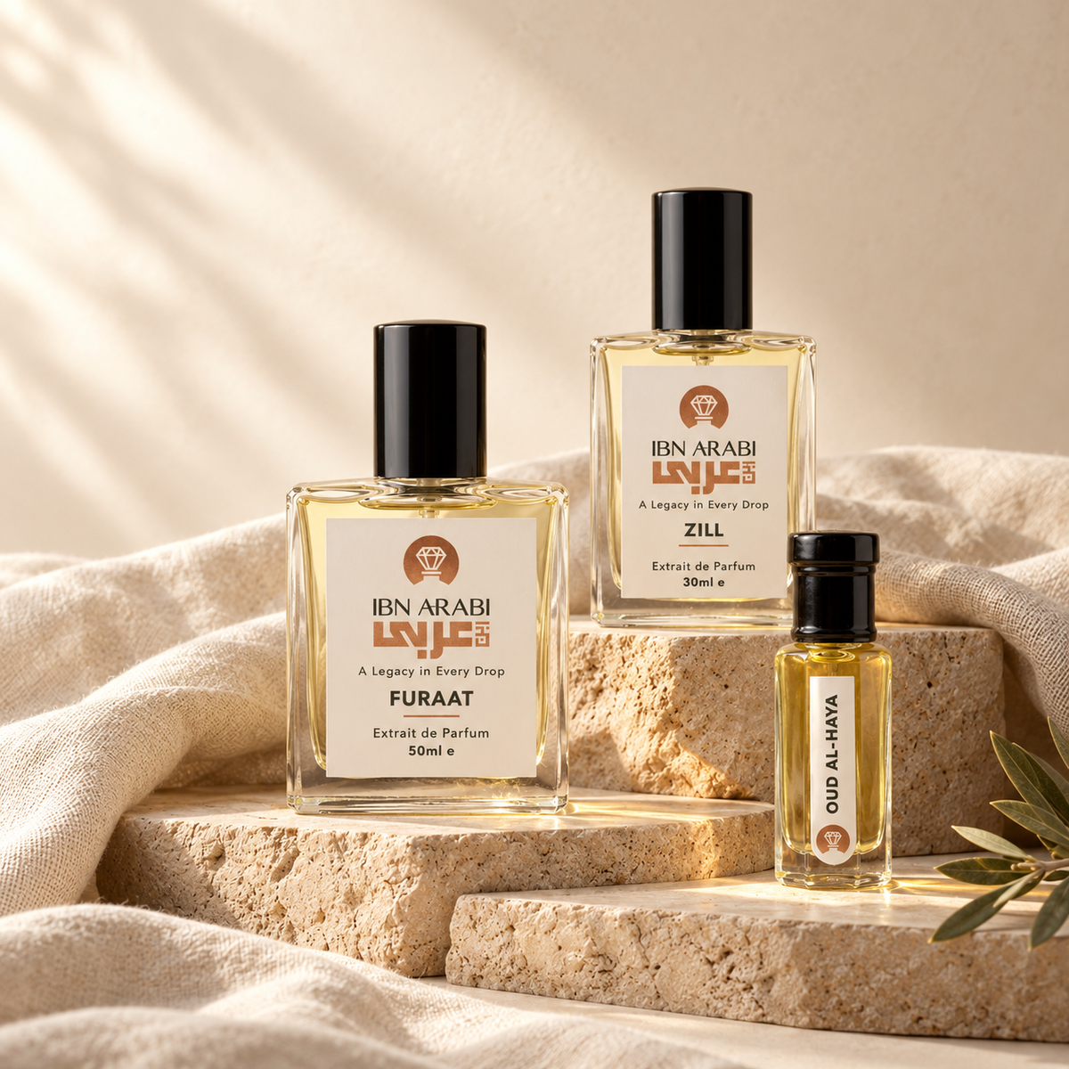 Furaat and Zill perfumes with Oud al Haya attar, arranged on warm travertine and linen.