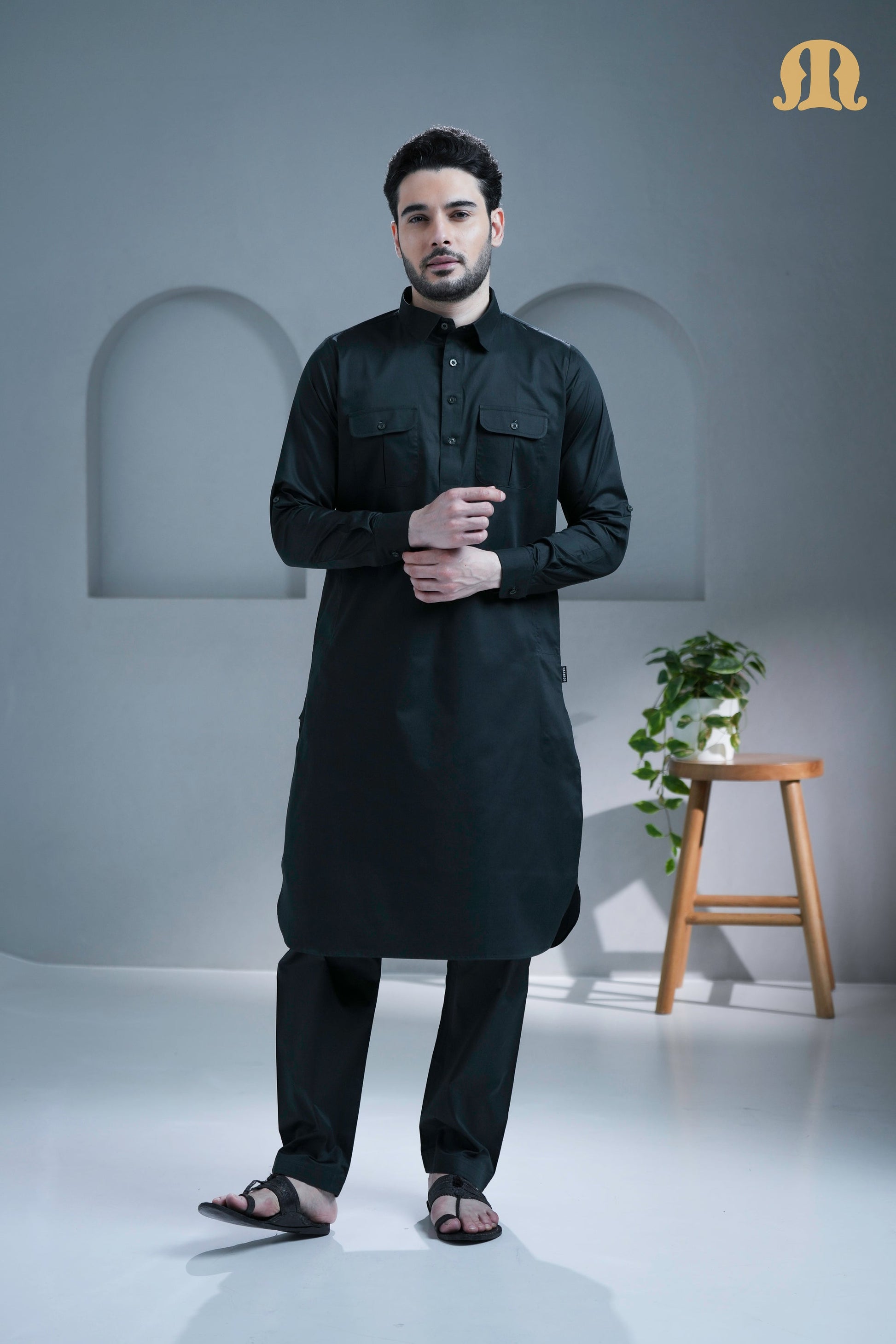 Front view of the complete Tunban Pathani Suit in dark grey by Mashroo.
