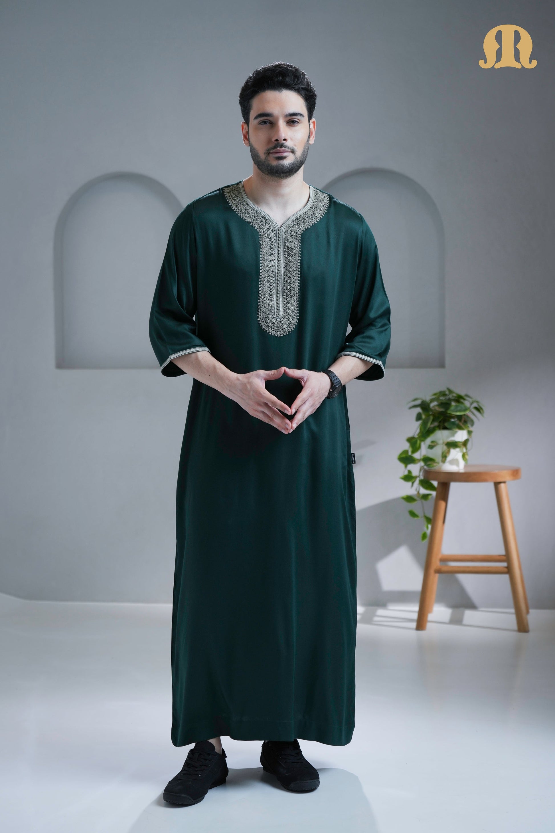 Front view of the Nasser Green Moroccan Thobe for men by Mashroo.
