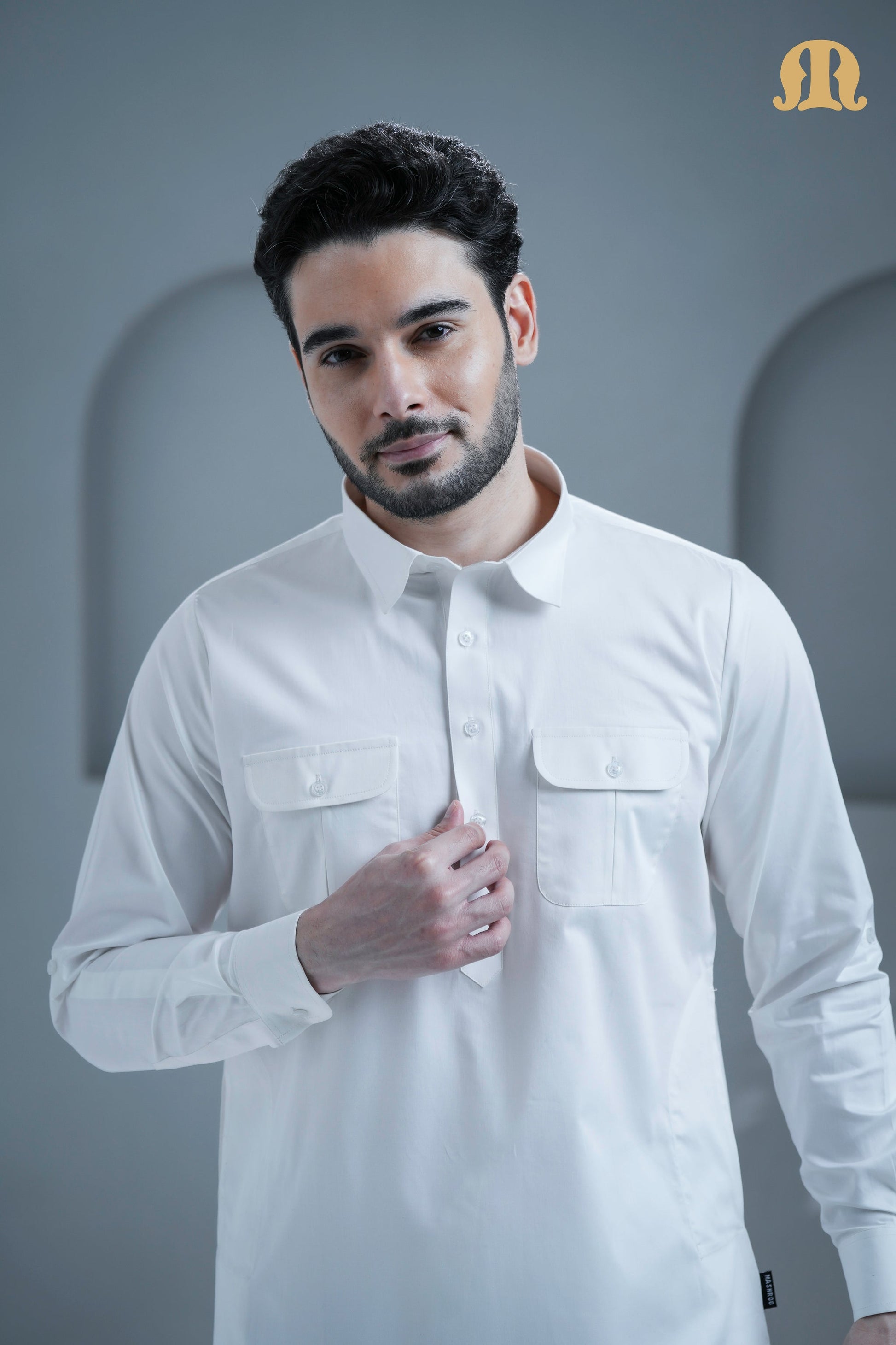 Man wearing the traditional Tunban Pathani White suit, perfect for Jummah prayers.
