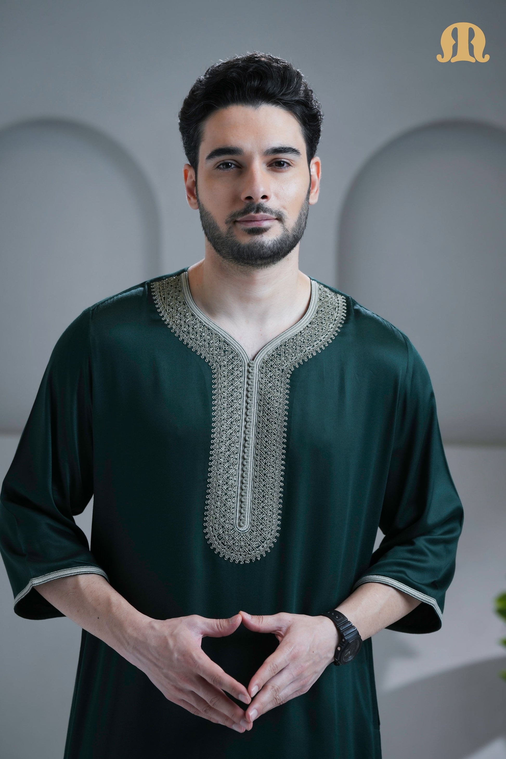 Man looking sophisticated in the Nasser Green Moroccan Thobe from HayaStyle.
