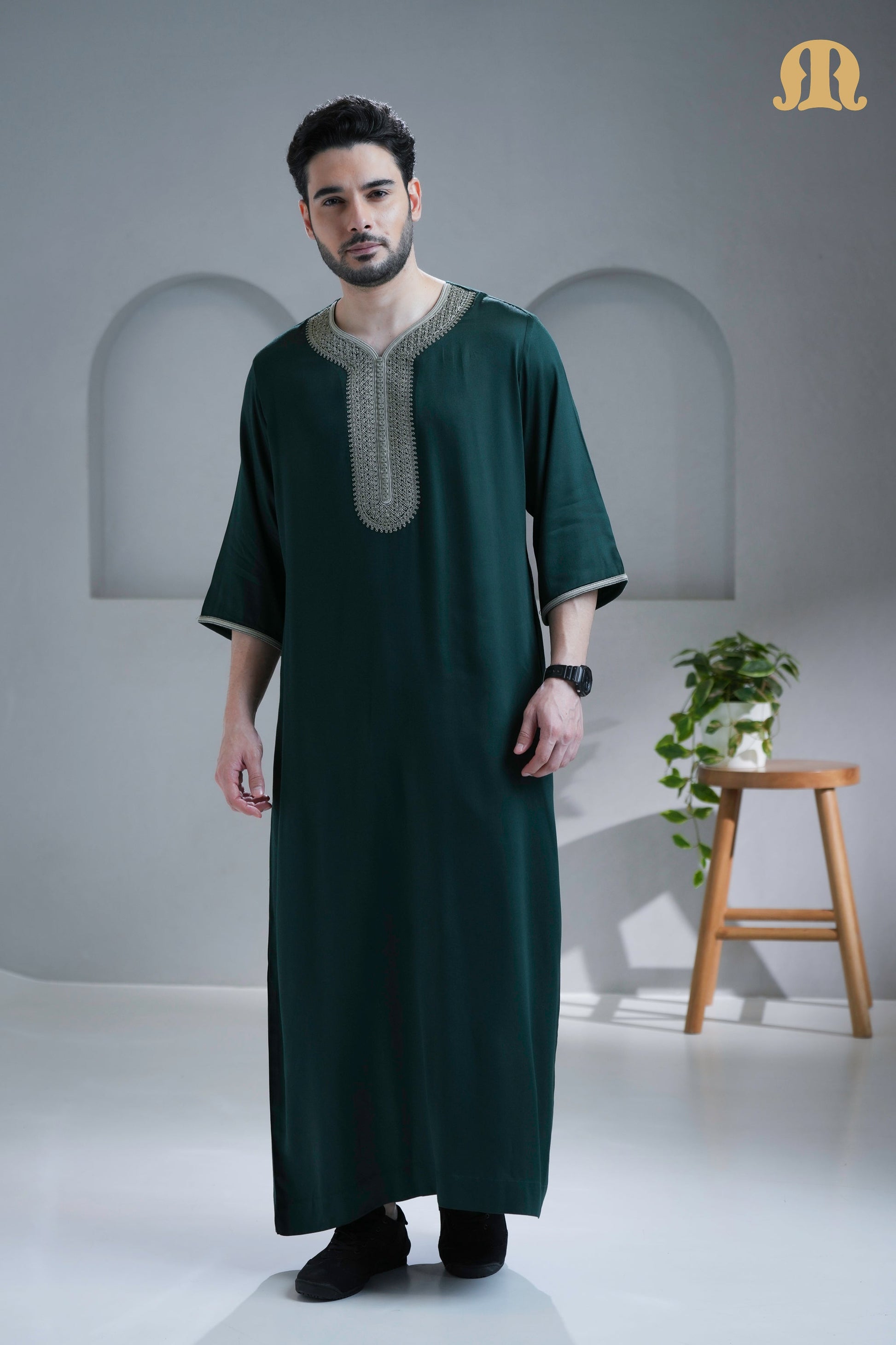 Detail of the modern 3/4 sleeve on the Nasser Green Moroccan Thobe.

