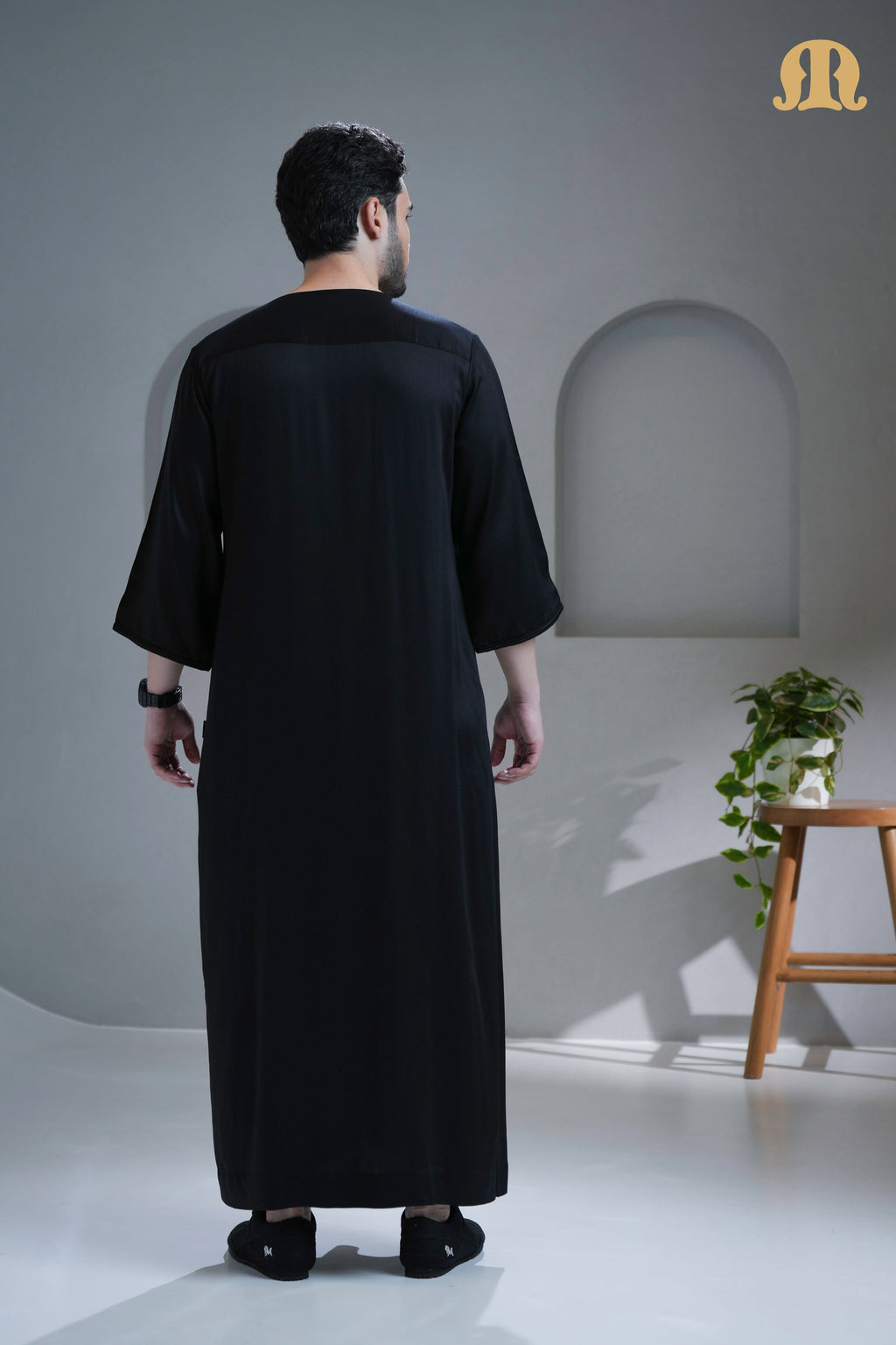 Front view of the Tiznit Black Moroccan Thobe for men by Mashroo.
